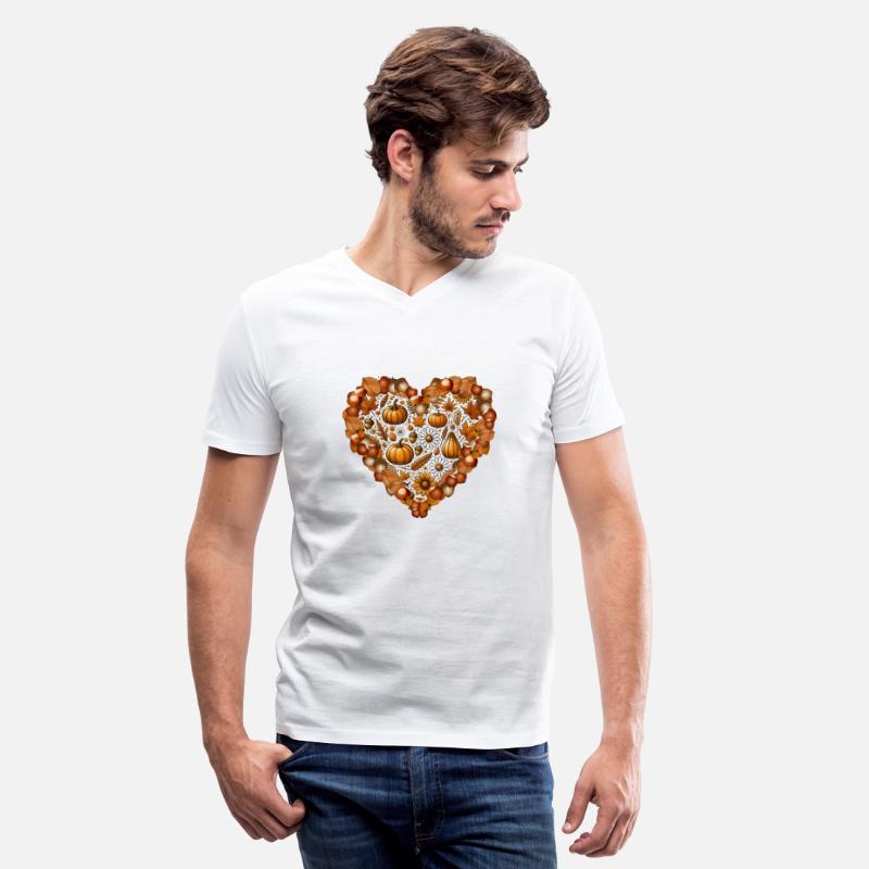 Heart filled with pumpkins, leaves and nuts