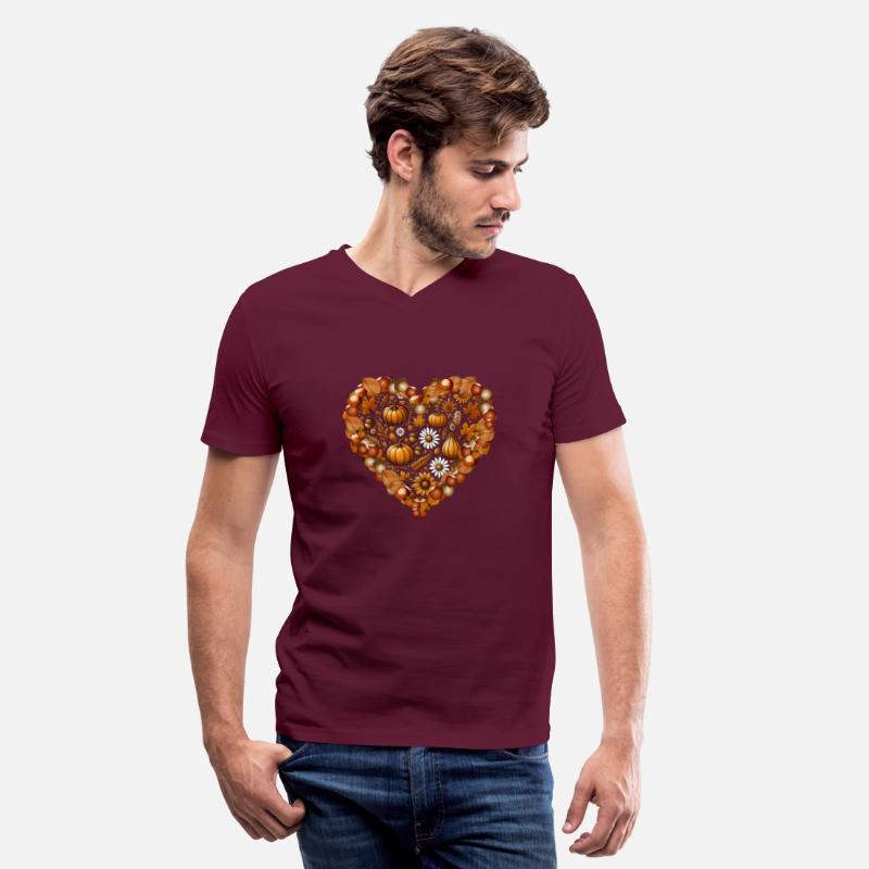 Heart filled with pumpkins, leaves and nuts